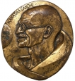 Gandhi Bronze Medal with the message of In The Midst of Darkness Light Prevails of France.