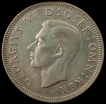 1942 Silver One Shilling Coin of United Kingdom.